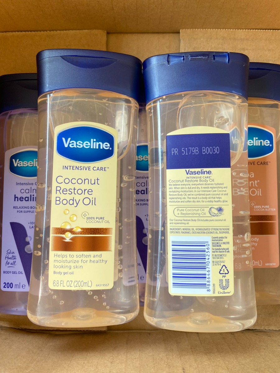 เหลือง Vaseline Intensive Care ** Coconut Restore Body Oil 200ml.