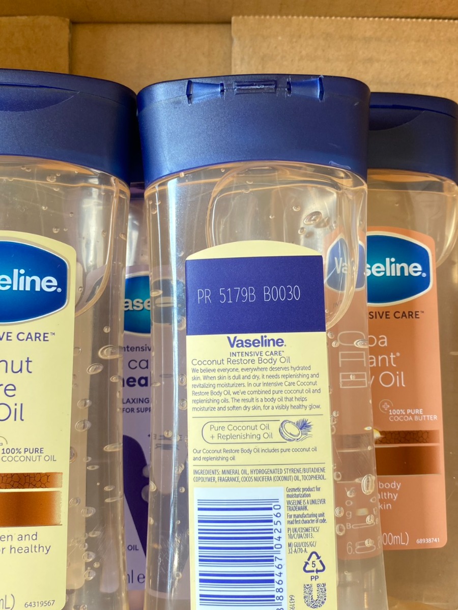 เหลือง Vaseline Intensive Care ** Coconut Restore Body Oil 200ml.